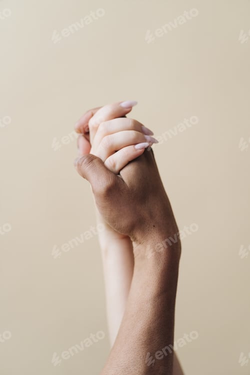 Preview: Young diverse couple holding hands, agree to bring the plan to life
