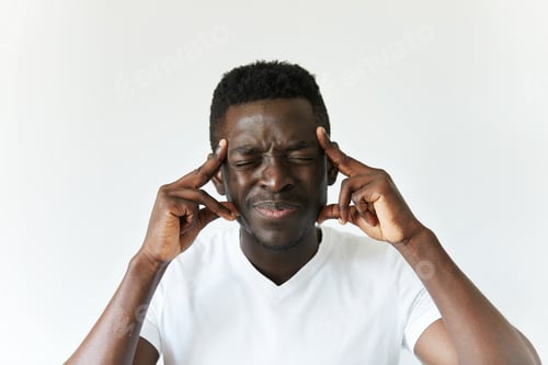 Preview: Portrait of young African male thinking over or trying to recollect something very important, with e