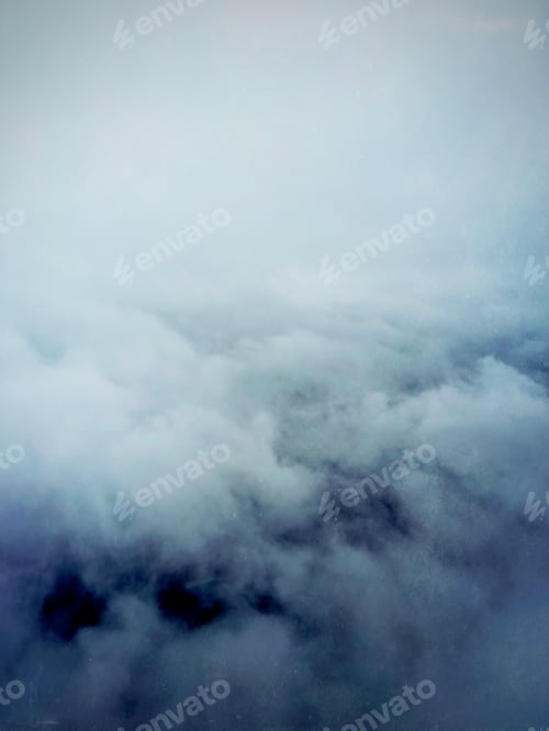 Preview: A Surreal Background of Moody Clouds and a Gray Sky From Above