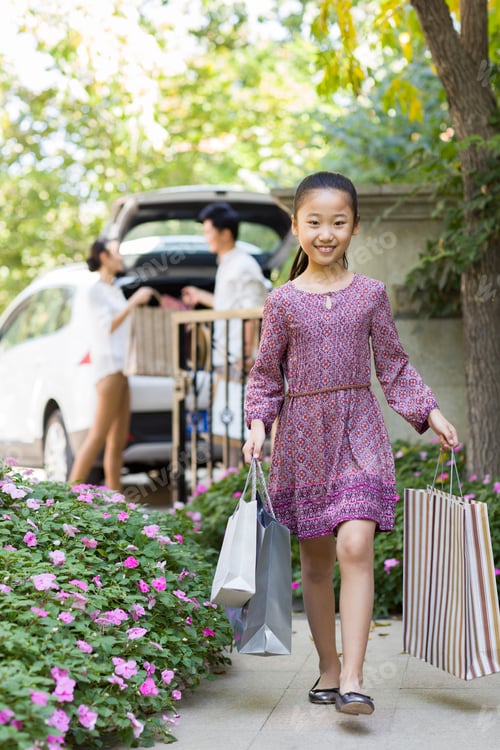 Preview: Young family coming back from shopping