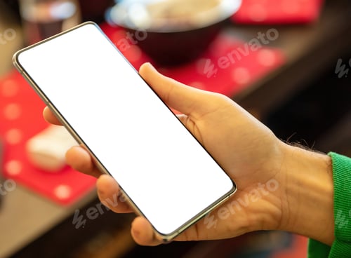 Preview: Cellphone empty display on a male hand. Man hold mobile phone with blank screen, close up.