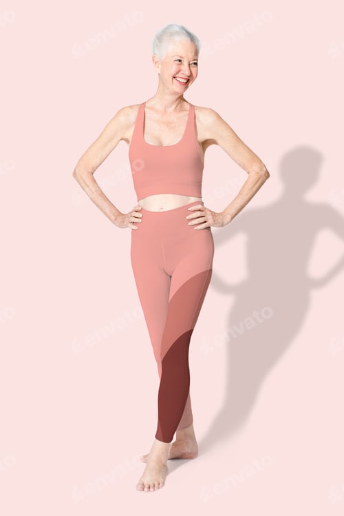 Preview: Healthy senior woman in pink sports bra and leggings full body