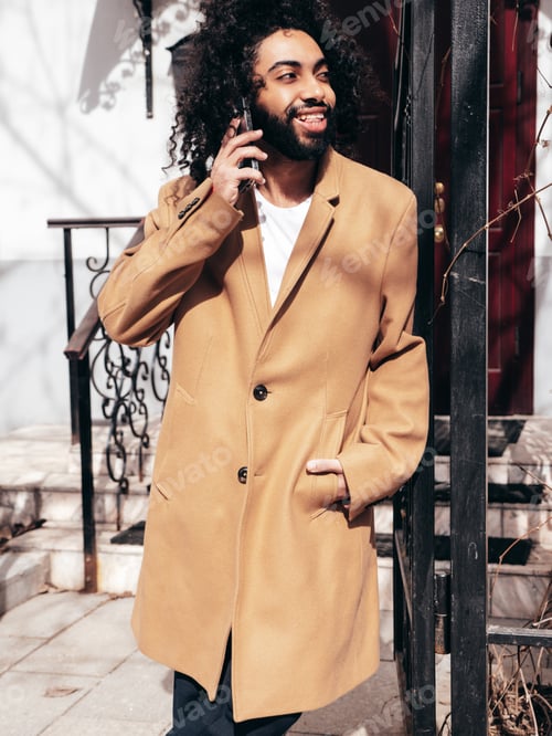 Preview: Handsome man posing outdoors