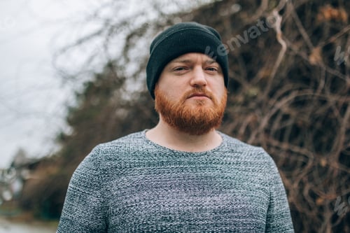 Preview: young man with Redhead beard, and cap