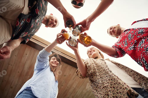 Preview: View from below. Group of people are with beer in hands having good time