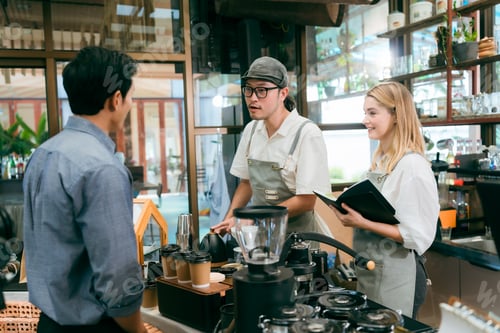 Preview: Cafe Excellence, Professional Baristas and Staff Serving Hot Drinks with Expertise