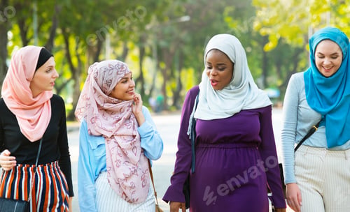Preview: Islamic women friends walking and discussing together