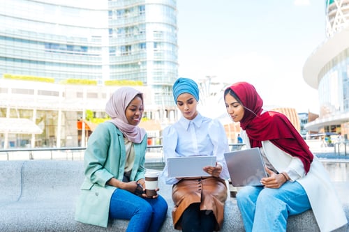Preview: Beautiful muslim girl wearing hijab bonding outdoors