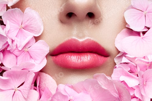 Preview: Close up view of beautiful woman lips with pink lipstick