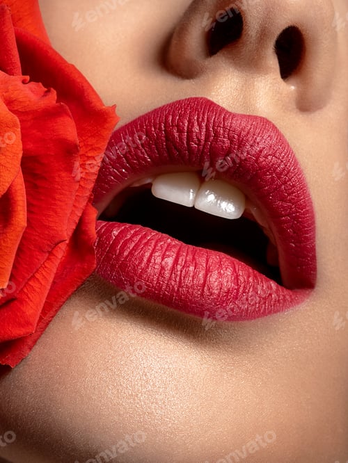 Preview: Closeup sexy female lips with red lipstick. Women's lips and red