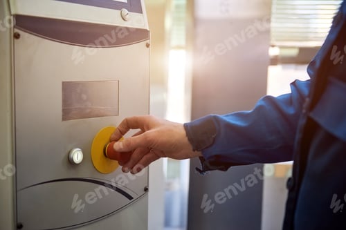 Preview: Man is rotating a red switch