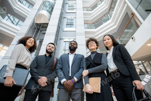 Preview: Group of business specialists in office