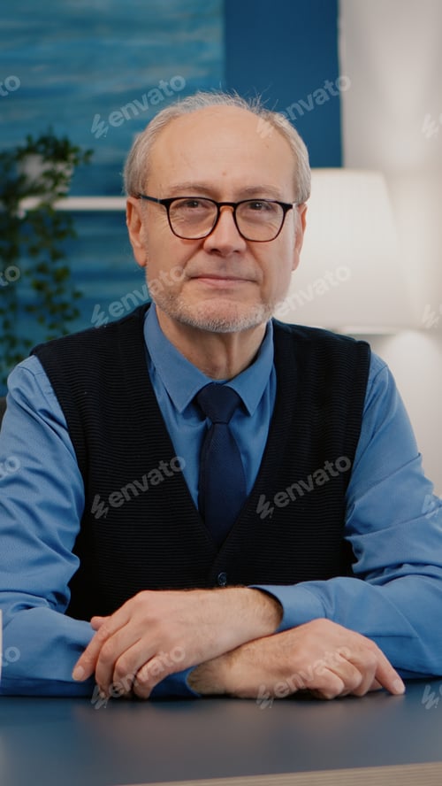 Preview: Portrait of senior man chatting and listening remote teamwork