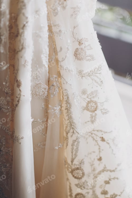 Preview: Stylish luxury beige wedding gown with lace floral pattern in light