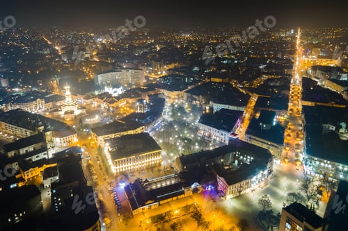 Preview: Aerial view of bright illuminated streets and buildings in Ukrainian Ivano-Frankivsk city center