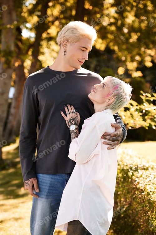 Preview: Loving couple shares a blissful moment in a sunlit garden during a warm afternoon