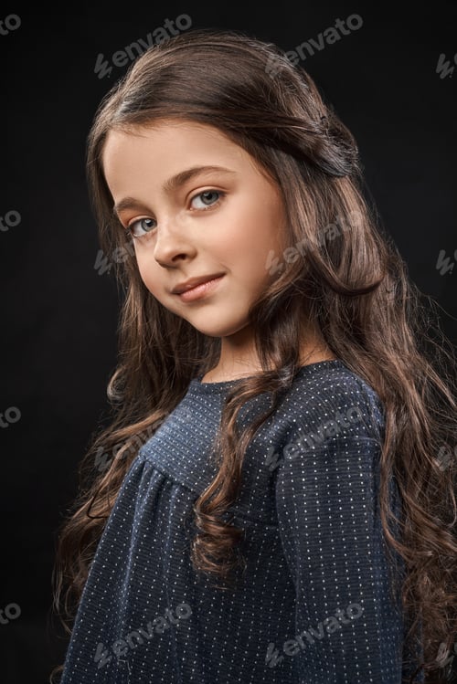 Preview: Beautiful girl portrait in studio on black background
