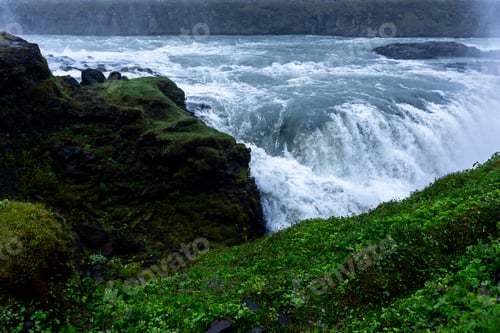 Preview: Beautiful view of Gullfoss waterfalls among green incredible nature in Iceland