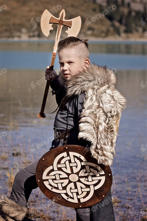 Preview: Young viking warrior in the Wolfskin cloak with wooden shield and axe