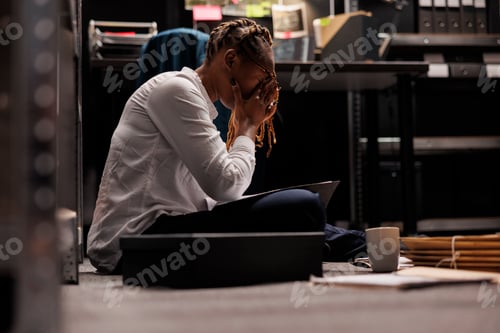 Preview: Detective with eyes pain working late analyzing crime case