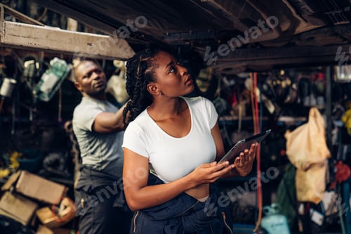 Preview: Team Auto mechanic are checking auto engine is problems at car repair shop.