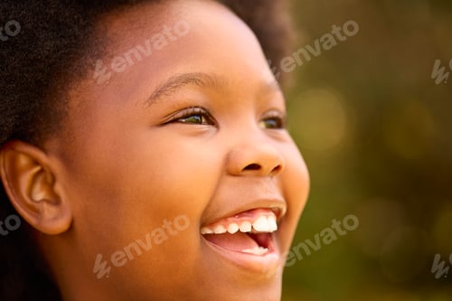 Preview: Close Up Of Smiling And Laughing Young Girl Outdoors In Countryside Or Garden