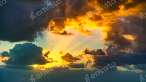 Preview: Golden Rays Break Through Storm Clouds