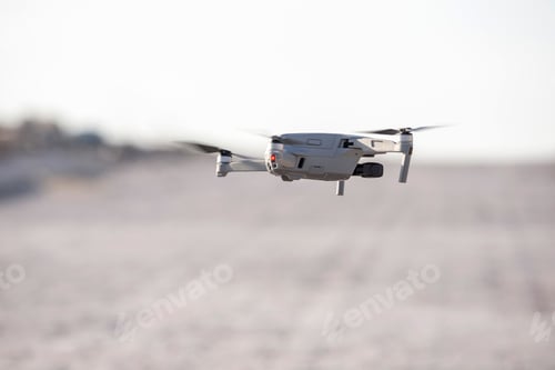 Preview: Drone hovering in the sky, landing to the ground