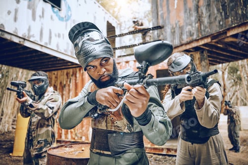 Preview: Paintball, team building and soldier target together for military, army and field game training. E