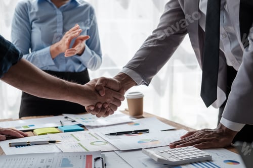 Preview: Handshake of business People deal business. Hold hand and shaking hand in office.