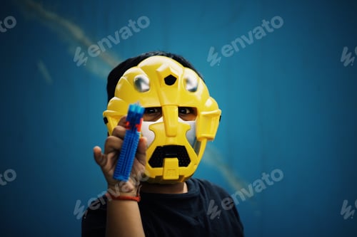 Preview: Kid with a yellow mask