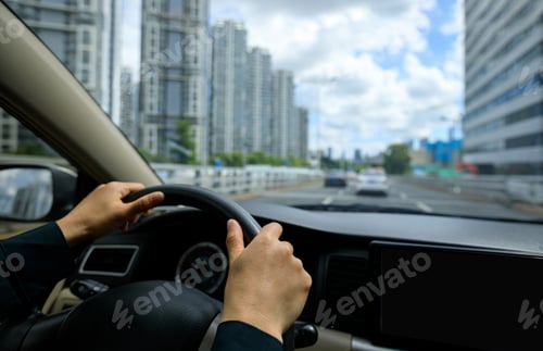 Preview: Driving car in modern city