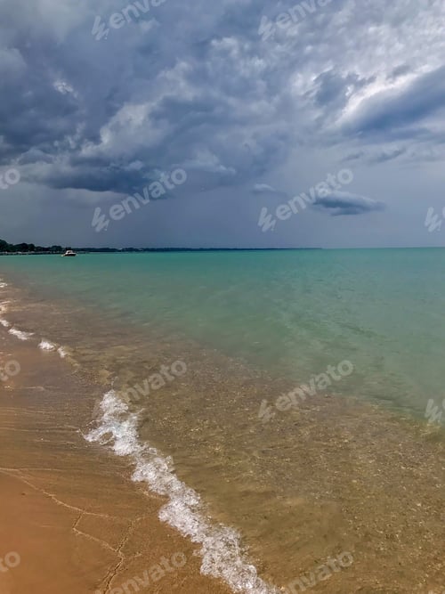 Preview: Dramatic sky over beautiful turquoise water