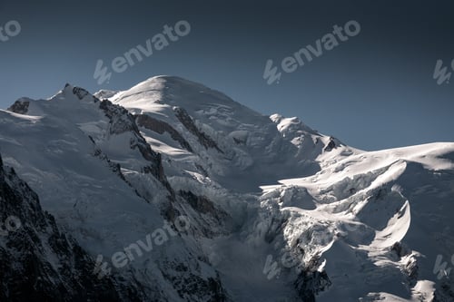Preview: Mount Mont Blanc covered in the snow under the sunlight in Chamonix, France
