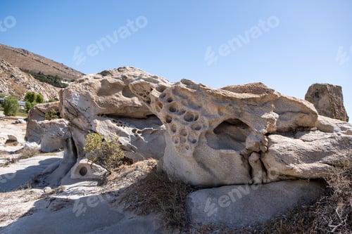 Preview: Granite grey rocks shaped by the sea salt and wind background. Kolymbithres Paros island Greece.