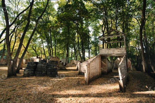 Preview: Old wooden big and strange building at the base for a paintball game