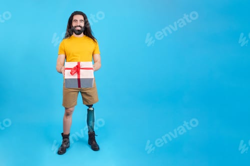 Preview: Man Standing Holding Present on a Blue Background