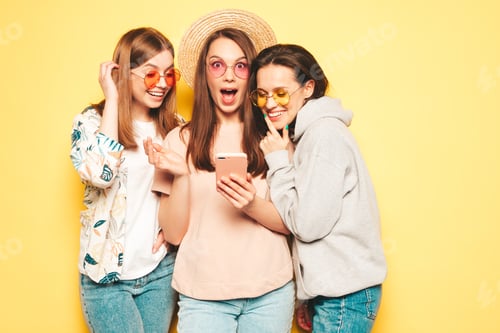 Preview: Three young beautiful women posing in studio