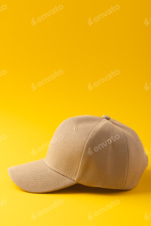 Preview: Cream baseball cap and copy space on yellow background