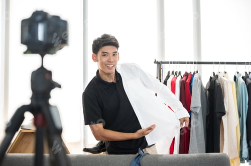 Preview: online business startup concept, young man vlogger working on the online marketing