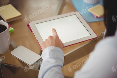 Preview: Close up of woman using tablet