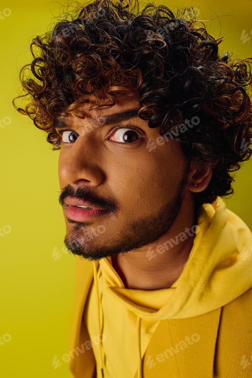 Preview: Vibrant Man in Yellow Hoodie