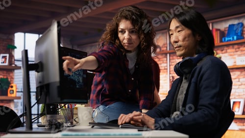Preview: Teamworking startup office colleagues using artificial intelligence