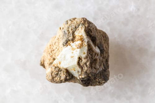 Preview: sample of rough achtarandite mineral on white