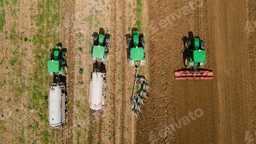 Preview: Tractors working seamlessly in unison exemplifies the spirit of rural life, where farm equipment and