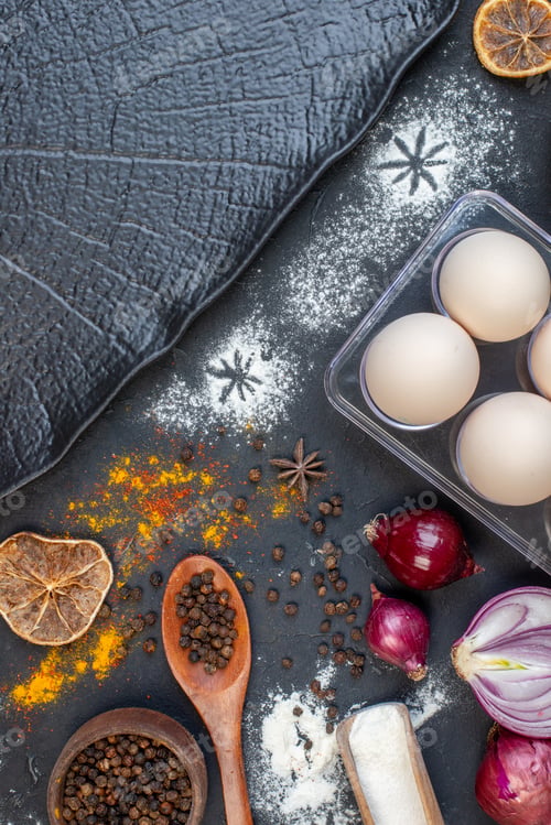 Preview: top view different ingredients flour eggs raw pasta and seasonings on dark background vegetable