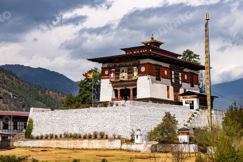 Preview: Traditional Bhutanese temple with mountainous backdrop.
