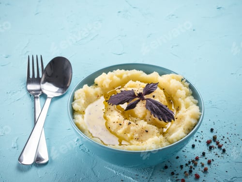 Preview: Mashed potatoes on blue concrete background
