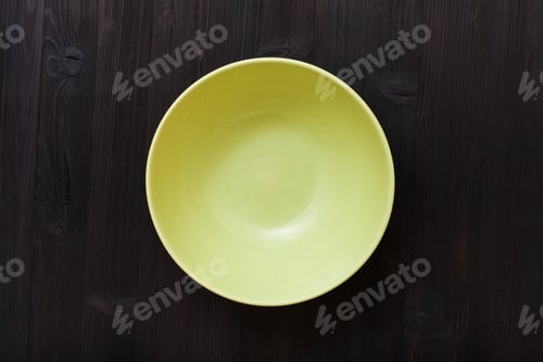 Preview: top view of green bowl on dark brown table