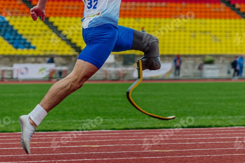 Preview: male runner para athlete on limb deficiency running track stadium